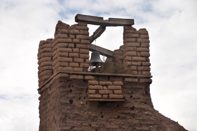 The original bell still stands in church steeple.